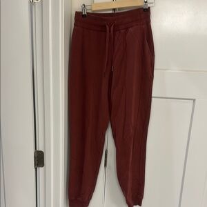 Like new lululemon soft jersey pant with drawstring! Size 4, maroon.